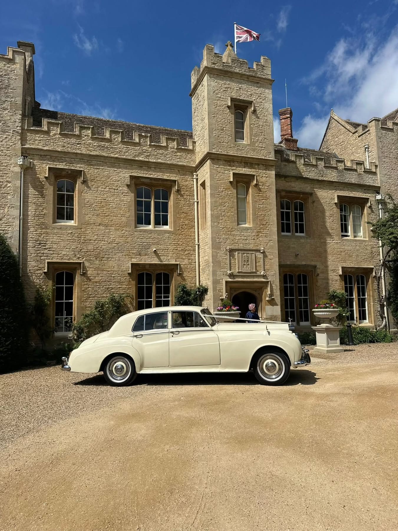 Rolls-Royce Silver Cloud ivory at castle wedding venue Bedfordshire